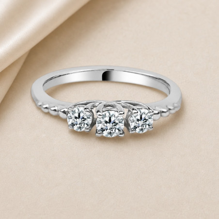 Solitario tresillo oro blanco · diamante natural 0,15 ct