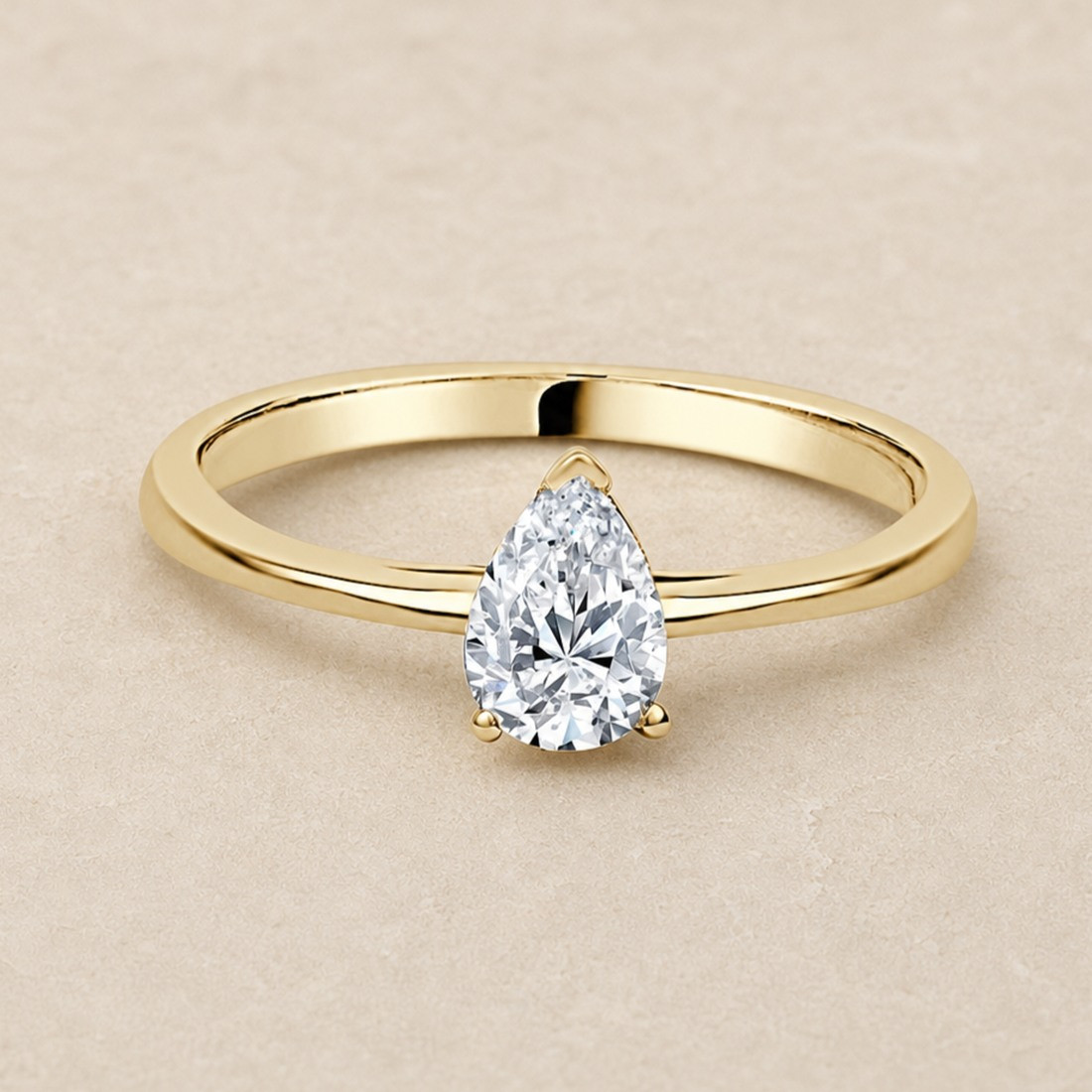 Solitario pera oro amarillo · diamante natural 0,50 ct