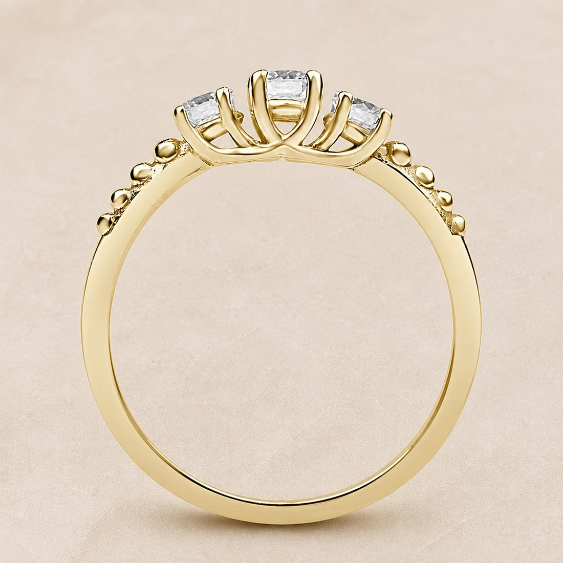 Solitario oro amarillo tresillo · perfil del engaste, diamante natural 0,15 ct | Joyería Bellido