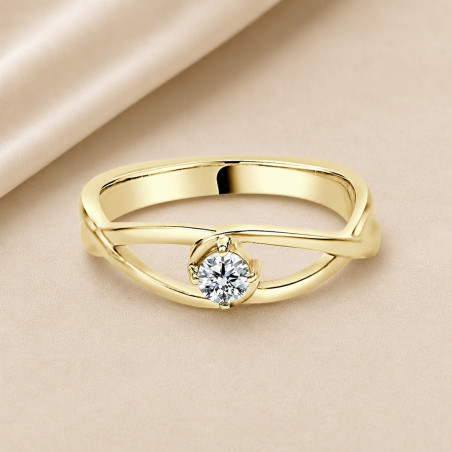 Solitario oro amarillo de diseño infinito · diamante natural 0,15 ct | Joyería Bellido
