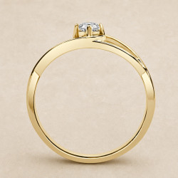 Solitario oro amarillo de diseño infinito · perfil del engaste, diamante natural 0,15 ct | Joyería Bellido