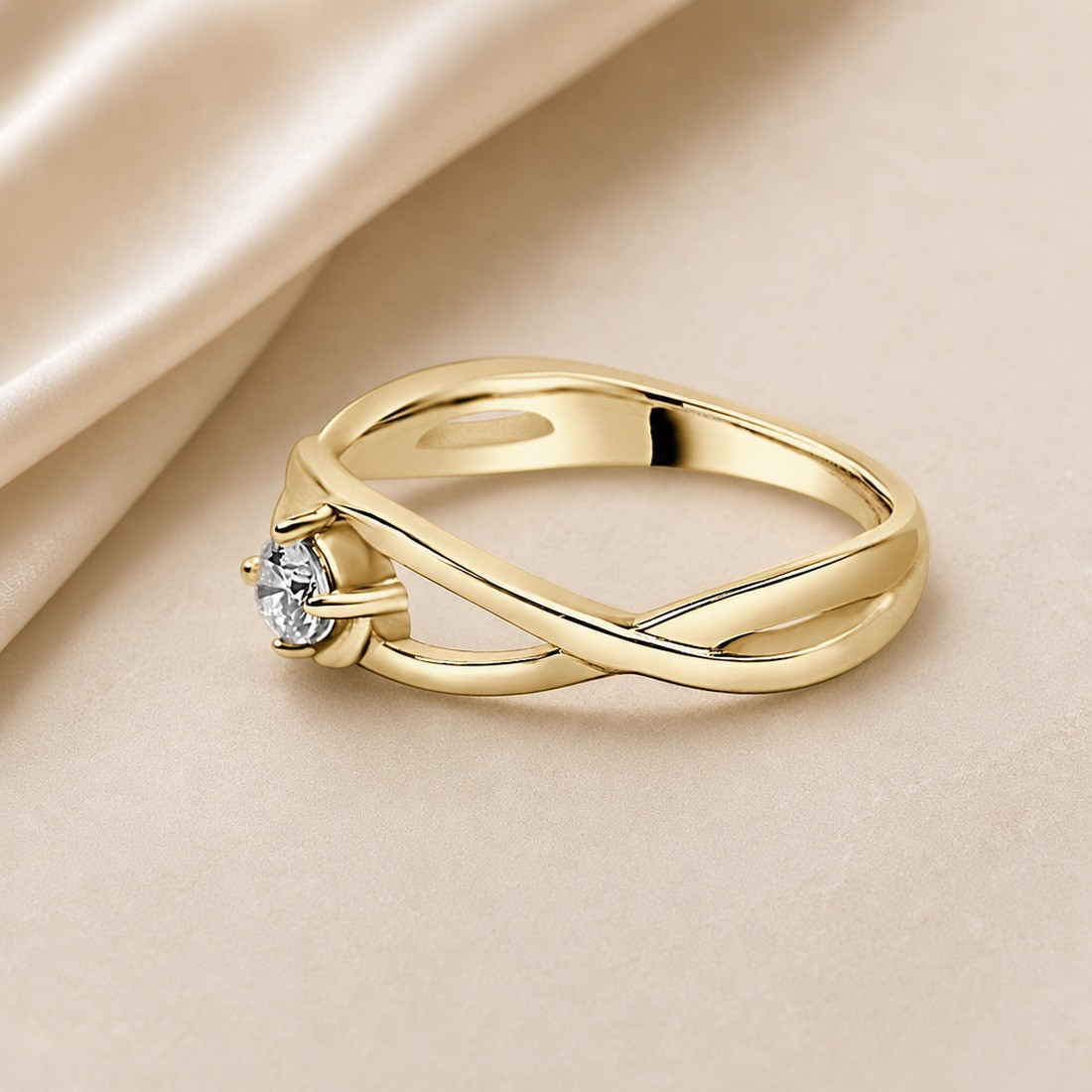 Solitario oro amarillo de diseño infinito · detalle del brazo entrelazado, diamante natural 0,15 ct | Joyería Bellido