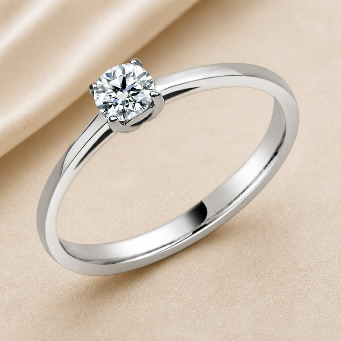 Solitario oro blanco de cuatro garras · vista en tres cuartos, diamante natural 0,30 ct | Joyería Bellido
