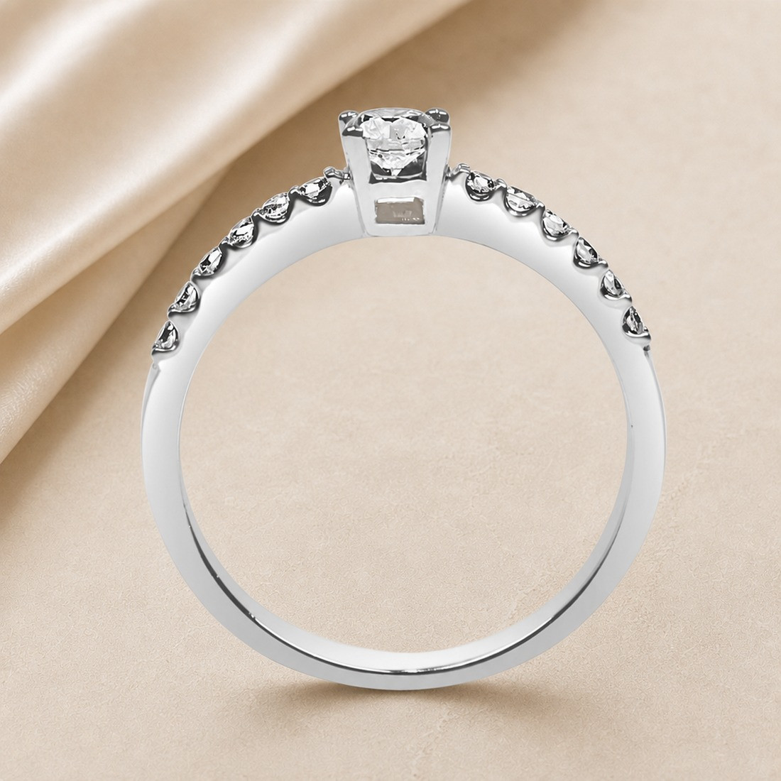 Solitario oro blanco con diamantes en el brazo · perfil del engaste, diamante natural 0,30 ct | Joyería Bellido