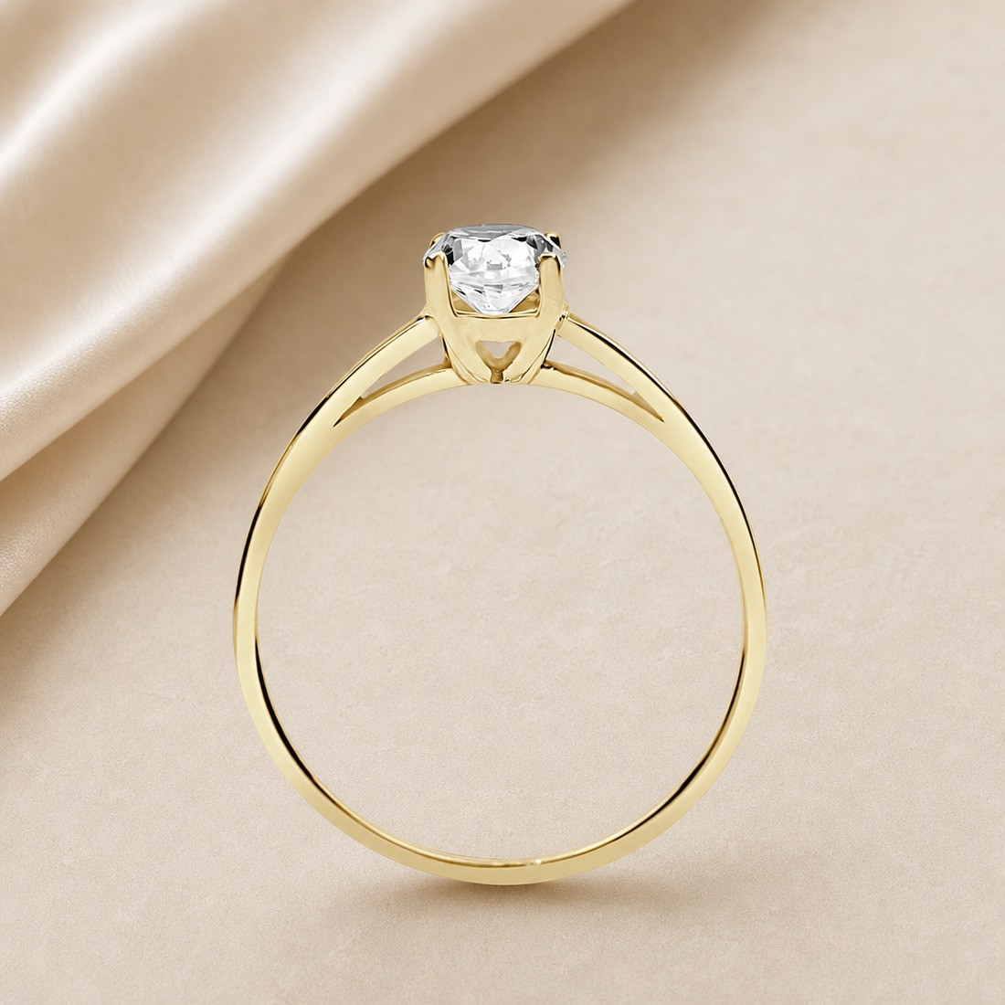 Solitario oro amarillo de cuatro garras · perfil del engaste, diamante natural 0,70 ct | Joyería Bellido