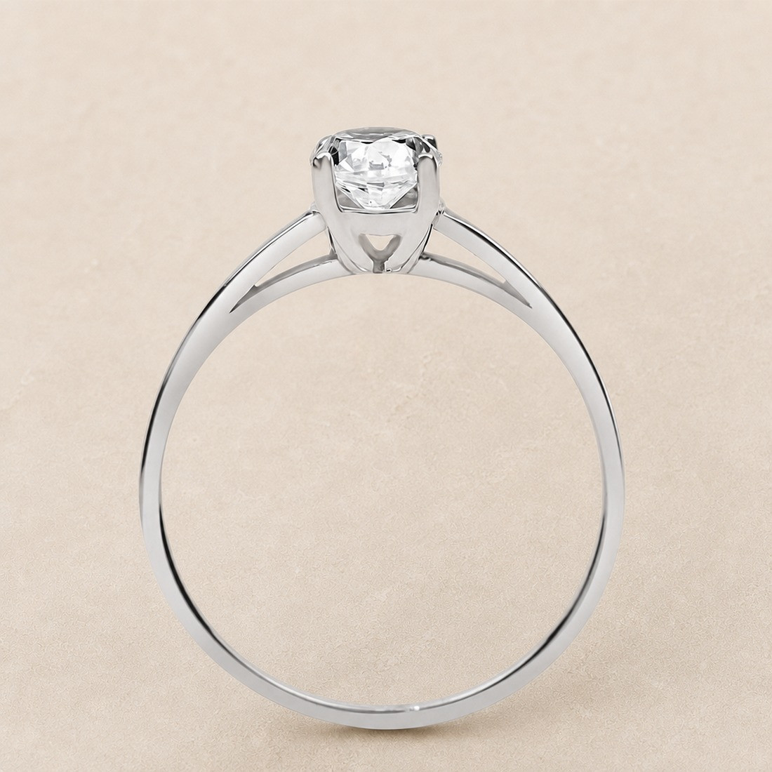 Solitario oro blanco de cuatro garras · perfil del engaste, diamante natural 0,70 ct | Joyería Bellido