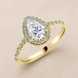 Solitario oro amarillo halo de talla pera · vista en tres cuartos, diamante natural 0,70 ct | Joyería Bellido