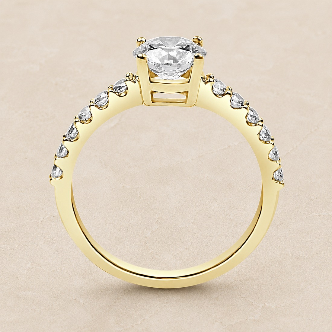 Solitario oro amarillo con diamantes en el brazo · perfil del engaste, diamante natural 1,00 ct | Joyería Bellido