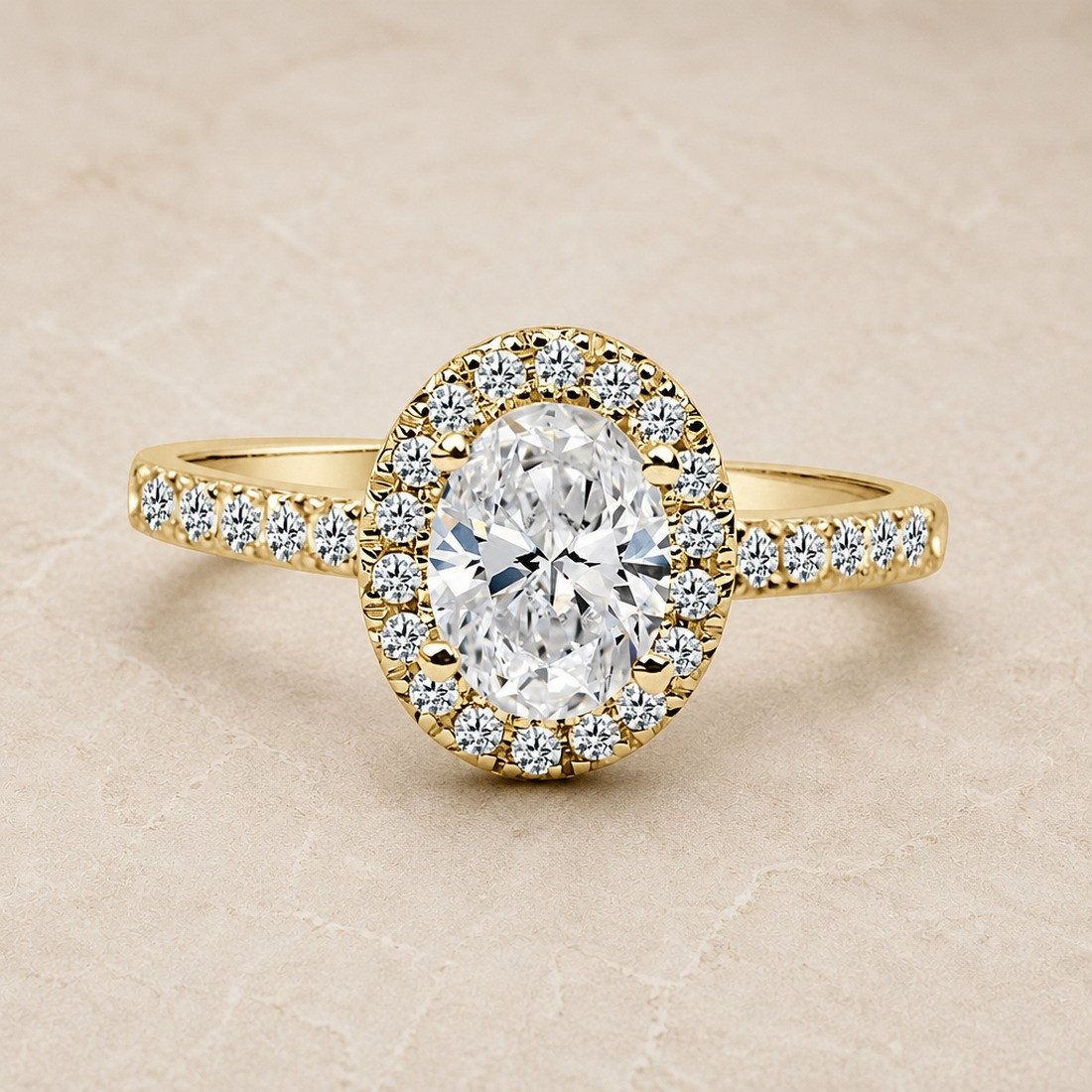 Solitario oro amarillo halo de talla oval · diamante natural 1,00 ct | Joyería Bellido