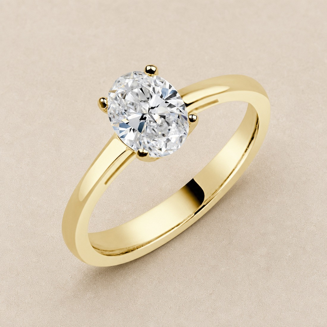 Solitario oro amarillo de talla oval · vista en tres cuartos, diamante natural 1,00 ct | Joyería Bellido