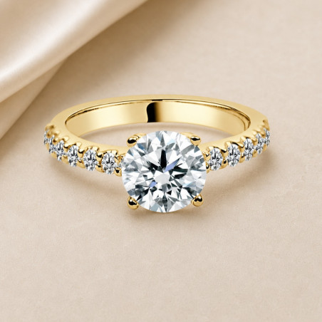 Solitario oro amarillo con diamantes en el brazo · diamante natural 1,50 ct | Joyería Bellido